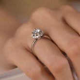 Ballerina halo lab diamond ring worn on finger, side view sparkle