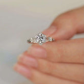 Front view of the solitaire flower diamond engagement ring, with intricate floral prong details.