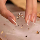 two-tone floral crown lab diamond ring side view with marquise accents