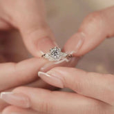 close-up of 1ct floral halo lab-grown diamond ring, leaf accents