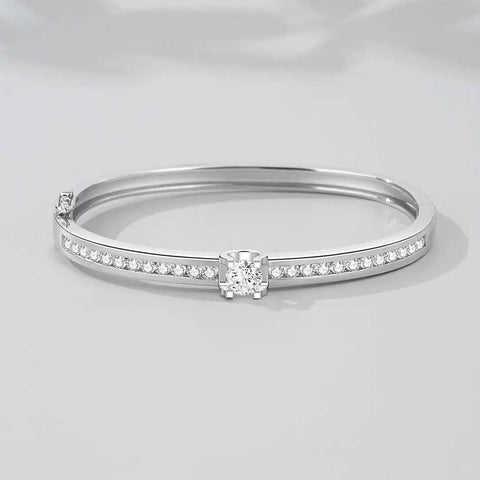 Timeless Sparkle: Elegant Sterling Silver Bangle with Central Stone