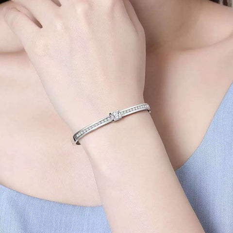 Timeless Sparkle: Elegant Sterling Silver Bangle with Central Stone
