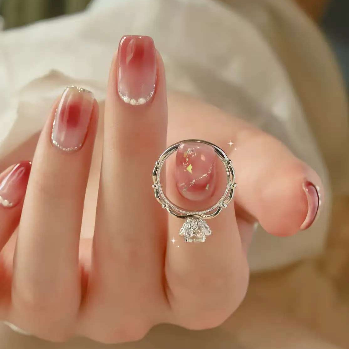 Bamboo Blossom round diamond ring on hand – bamboo stem band with lotus setting