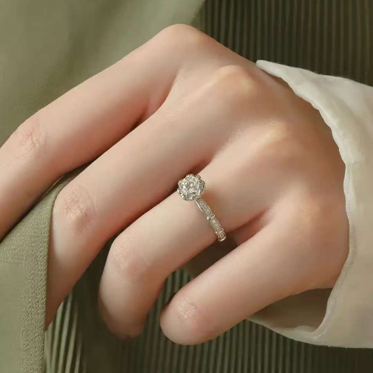 Bamboo Blossom round diamond ring on hand – bamboo stem band with lotus setting
