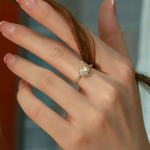 Rose gold halo lab diamond engagement ring with baguette and round accents