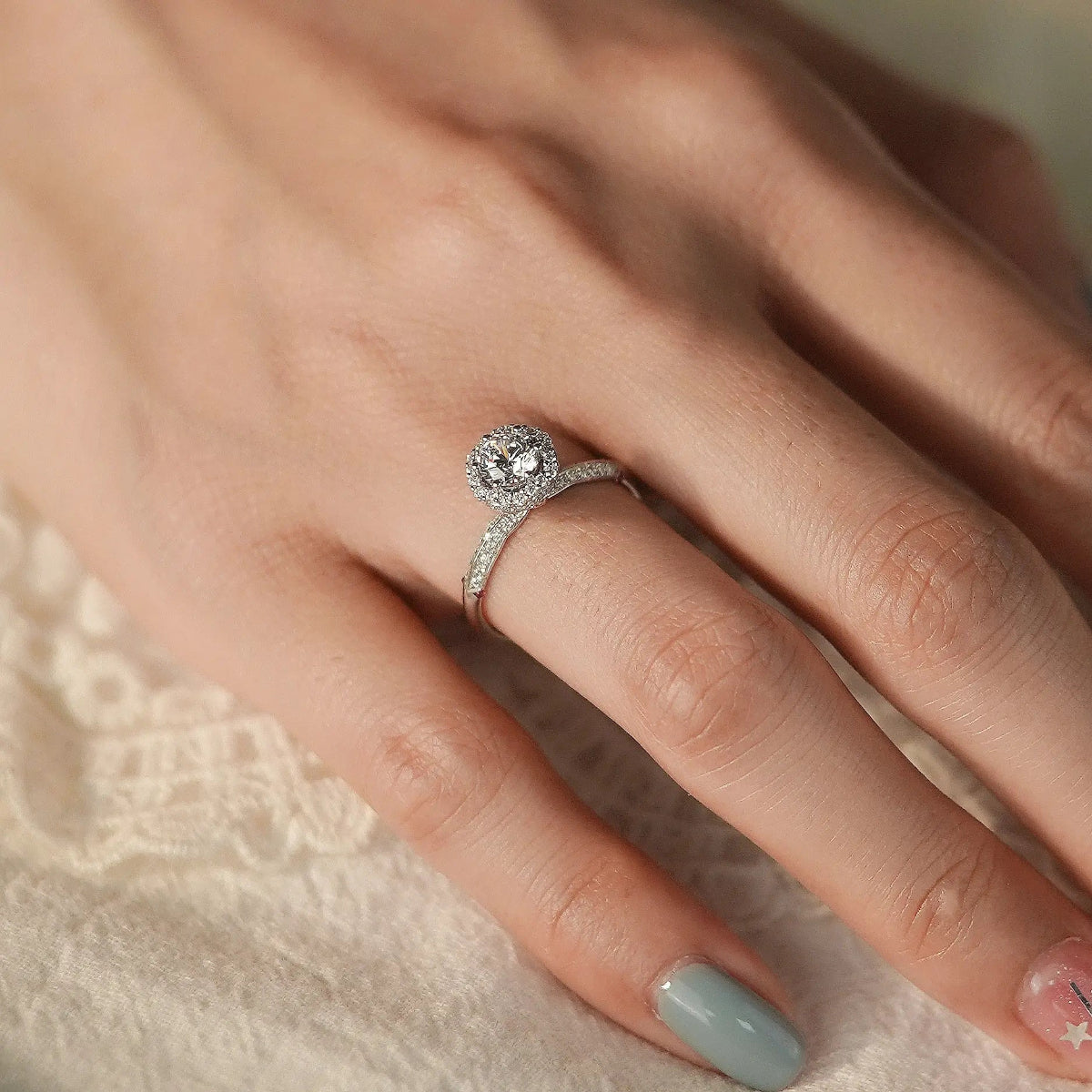 lab diamond halo engagement ring on hand, 18K rose gold