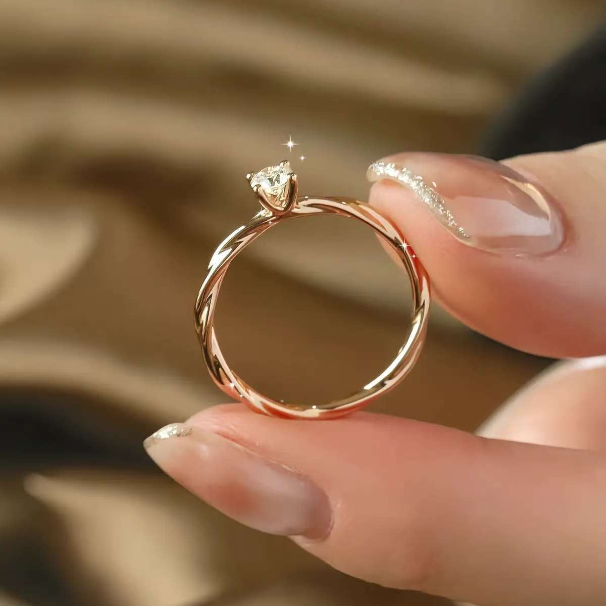 14k gold rope solitaire engagement ring close-up
