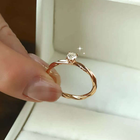 minimalist twisted band 0.25ct lab diamond solitaire ring in rose gold box
