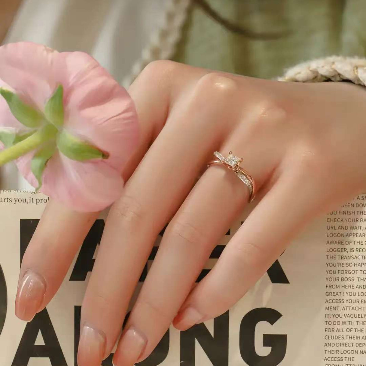 Modern architectural diamond ring styled with magazine and pastel outfit