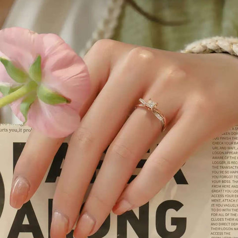 Modern architectural diamond ring styled with magazine and pastel outfit