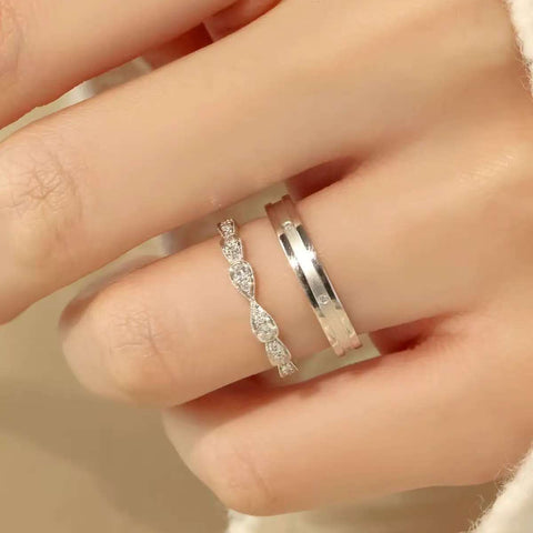 matching wedding bands on hand pavé eternity ring and sleek men’s band