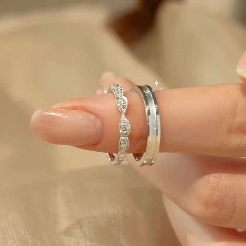 diamond couple rings set pavé twist and comfort band 18k white gold close-up