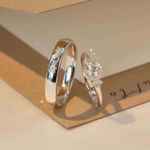 Diamond engagement ring and men’s wedding band crafted in 18K white gold, timeless style for couples.