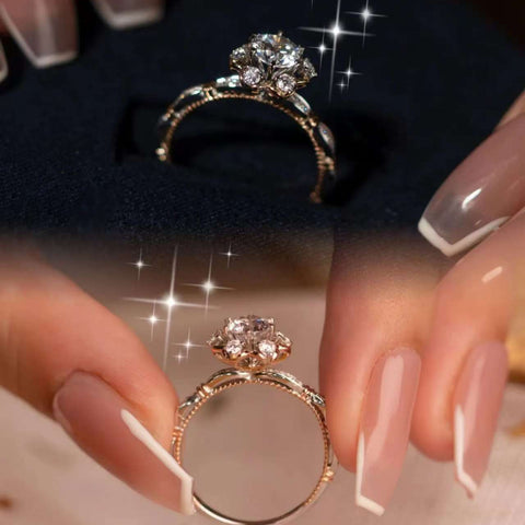 flat-lay of floral crown diamond ring with festive star confetti