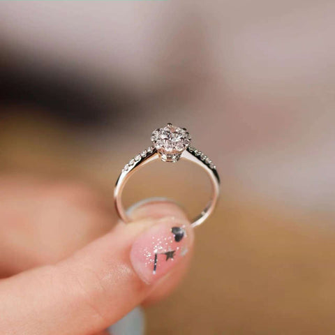 side view of floral halo lab diamond ring showing gallery petals, 14K gold