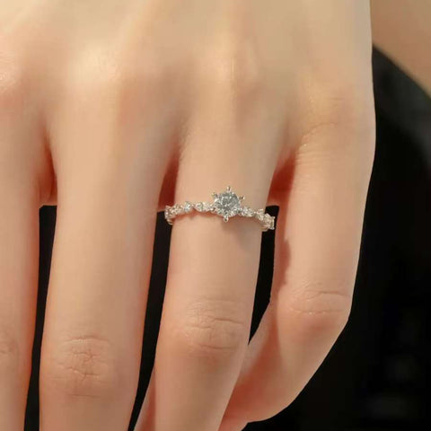 hand model wearing 1 carat leaf vine lab diamond ring