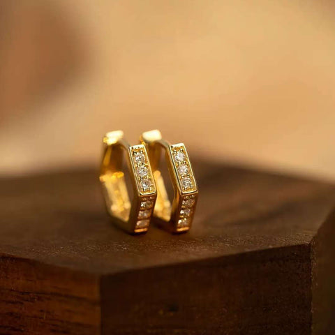 Standing pair of hexagon pavé hoops showing side diamonds
