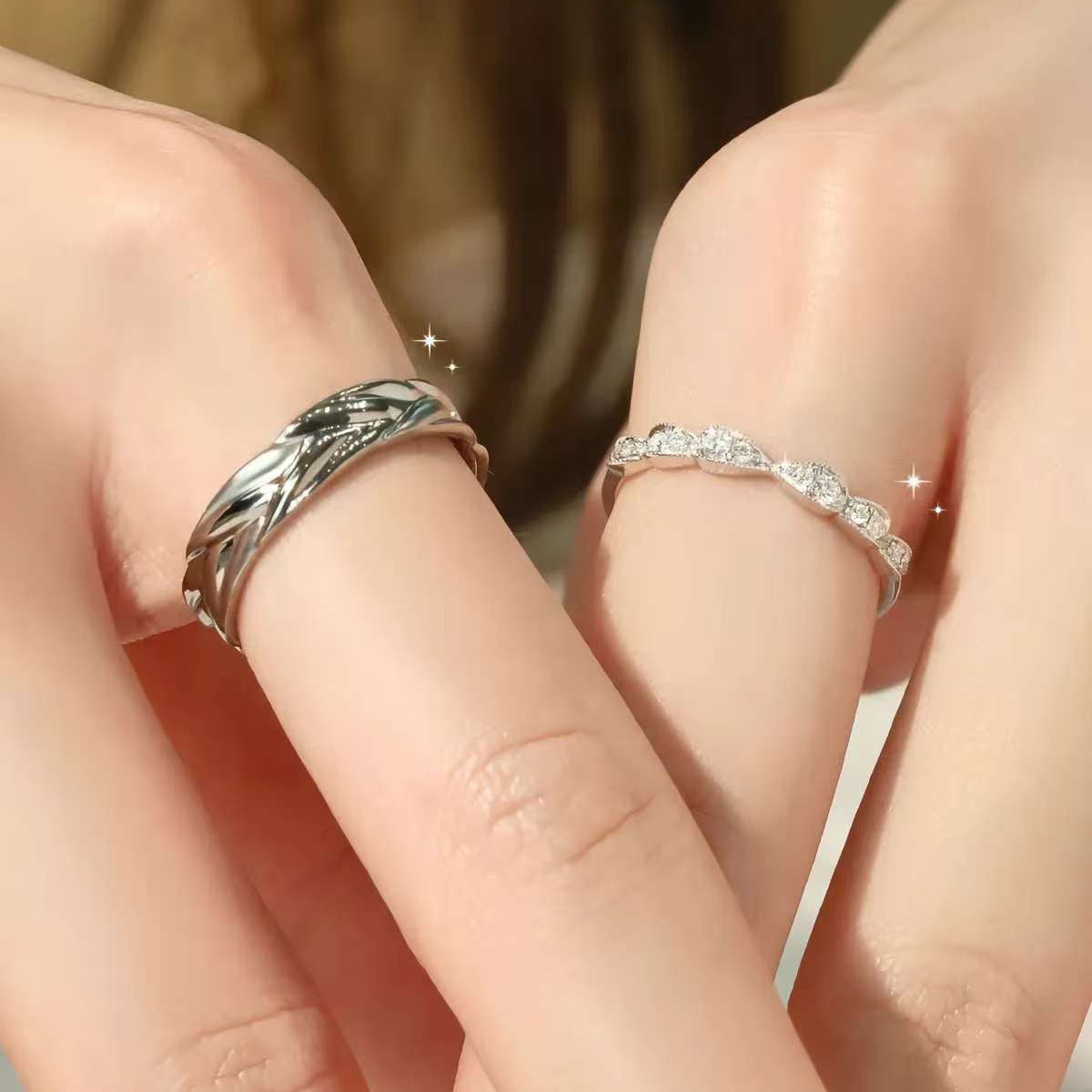 matching sterling silver couple rings worn on hands