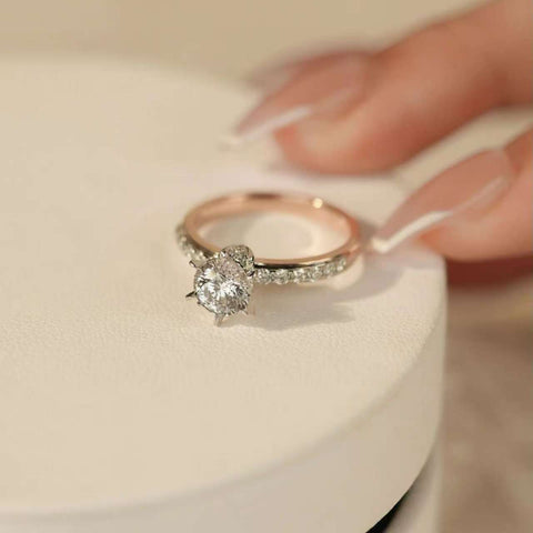 lab-grown diamond solitaire ring on hand, pavé band, 14K/18K white gold head
