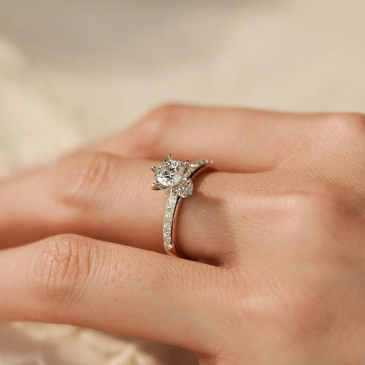 two-tone engagement ring upright, white gold basket, pavé shank detail